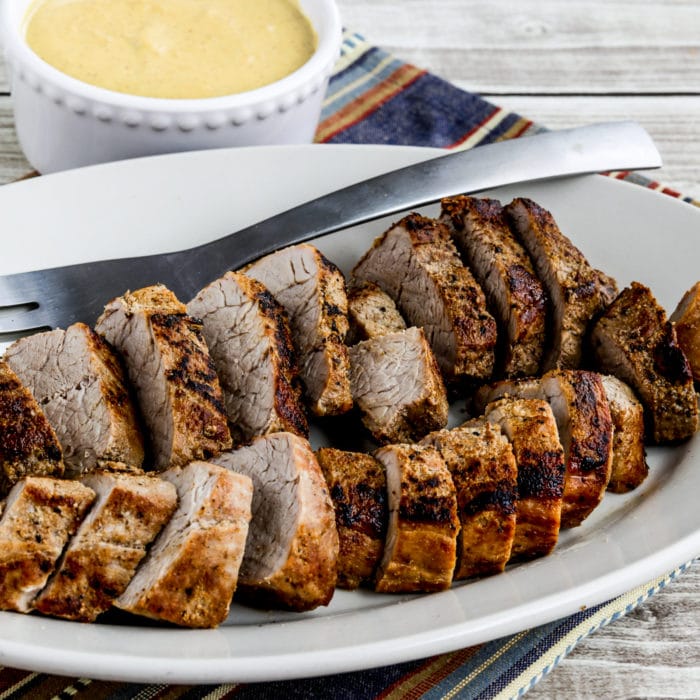 Pork Tenderloin with Mustard Sauce square image of finished pork on serving plate with sauce