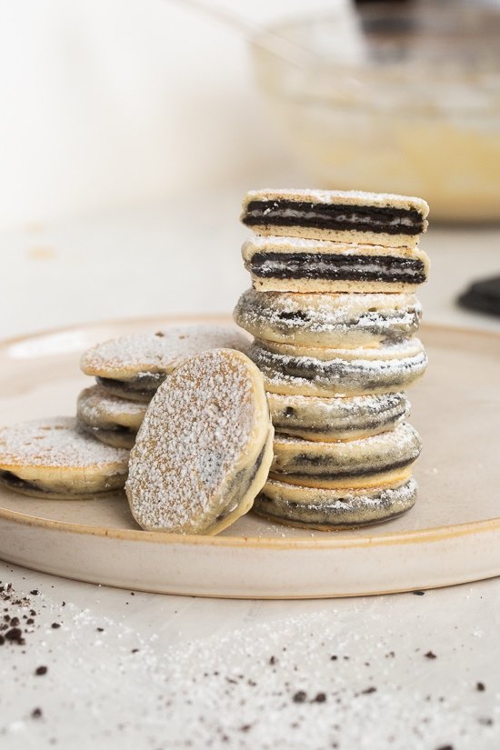 Fried Oreo thins, stacked on a plate.