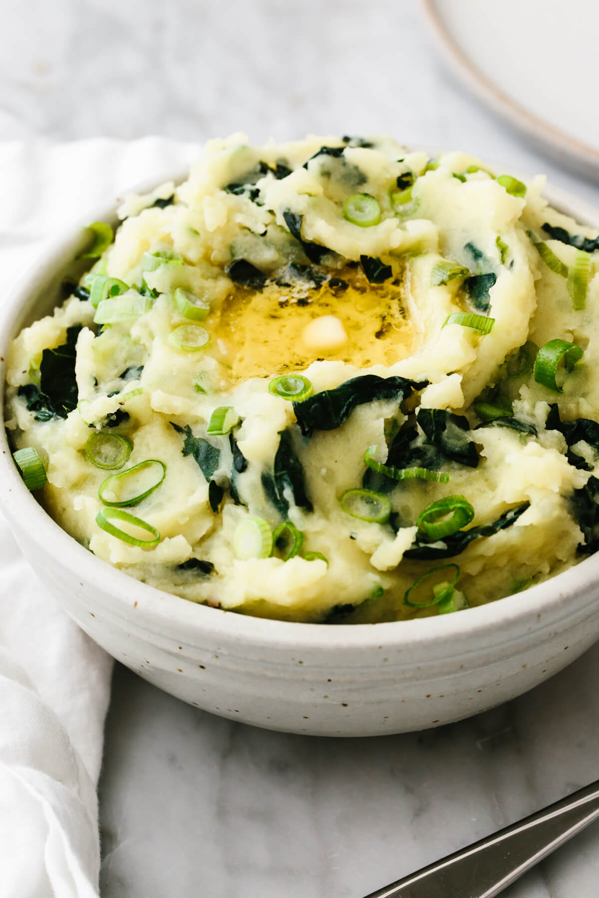 A bowl of creamy colcannon with kale.