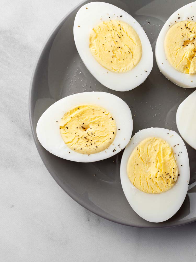 hard boiled eggs cut in half and seasoned with salt and pepper