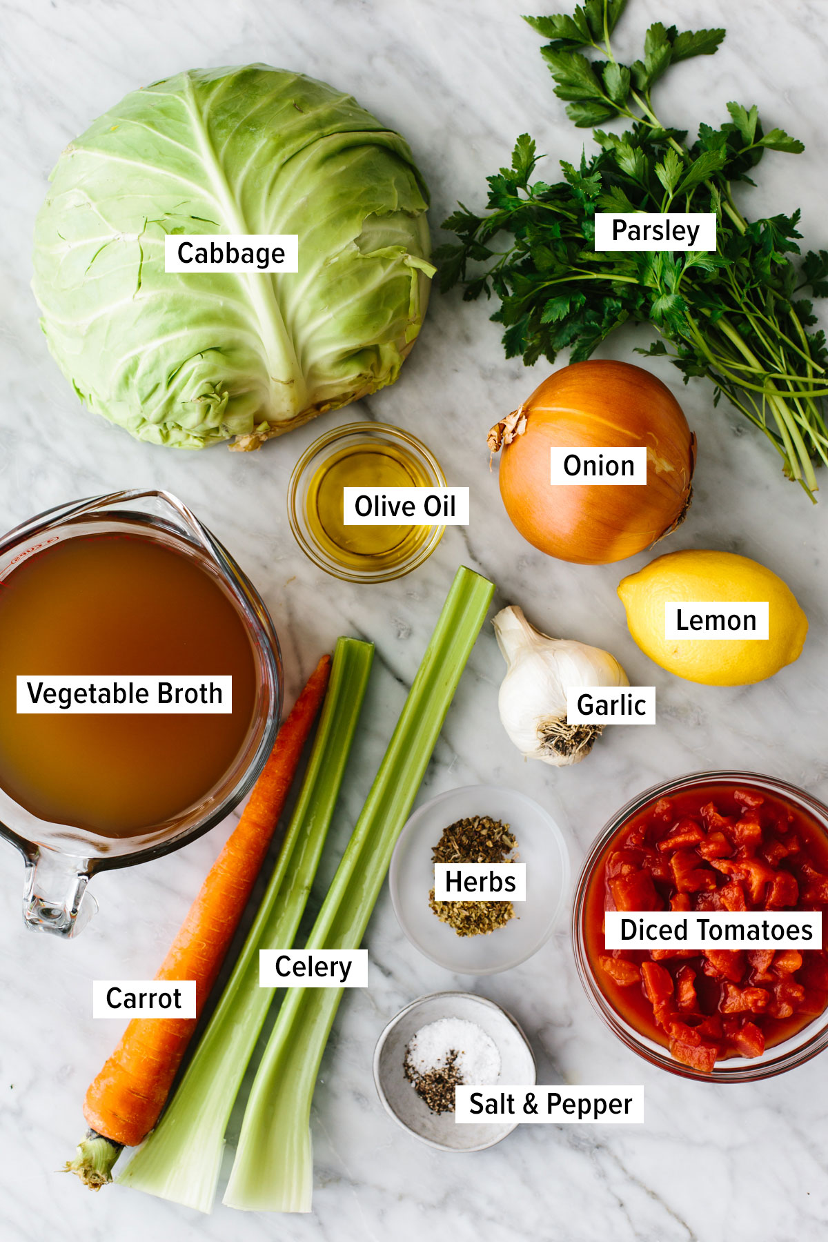Ingredients for cabbage soup on a table.