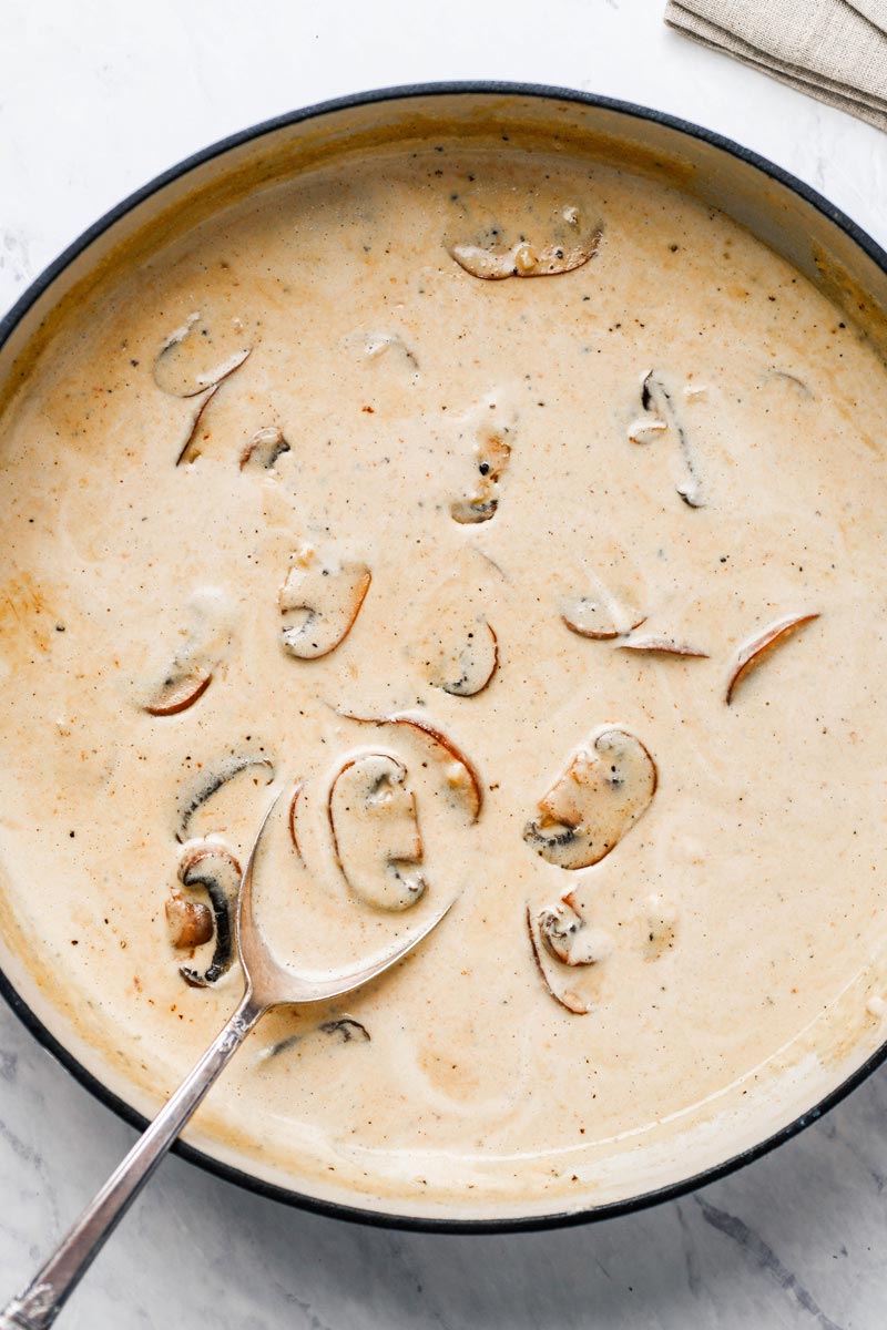 Creamy mushroom sauce in a skillet