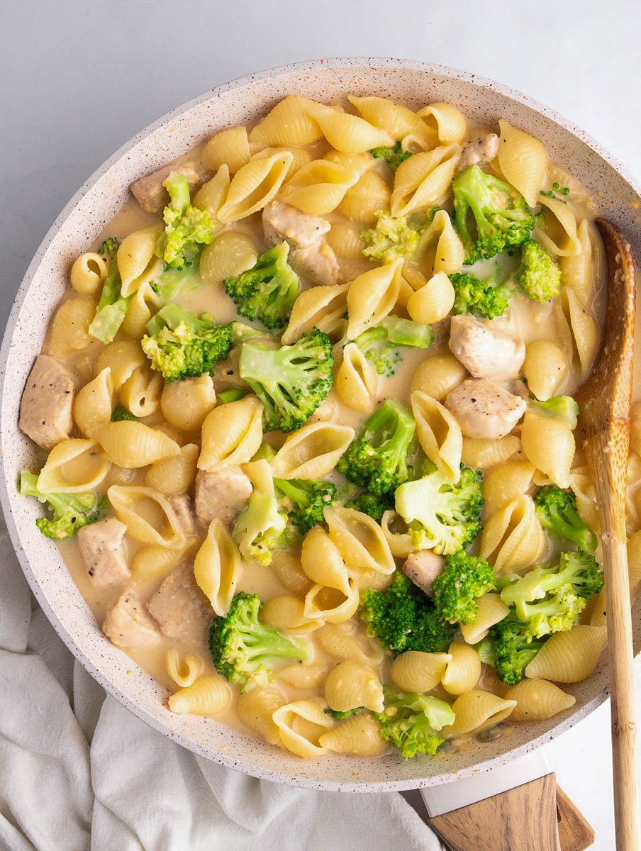 top down shot of the creamy broccoli chicken in a skillet