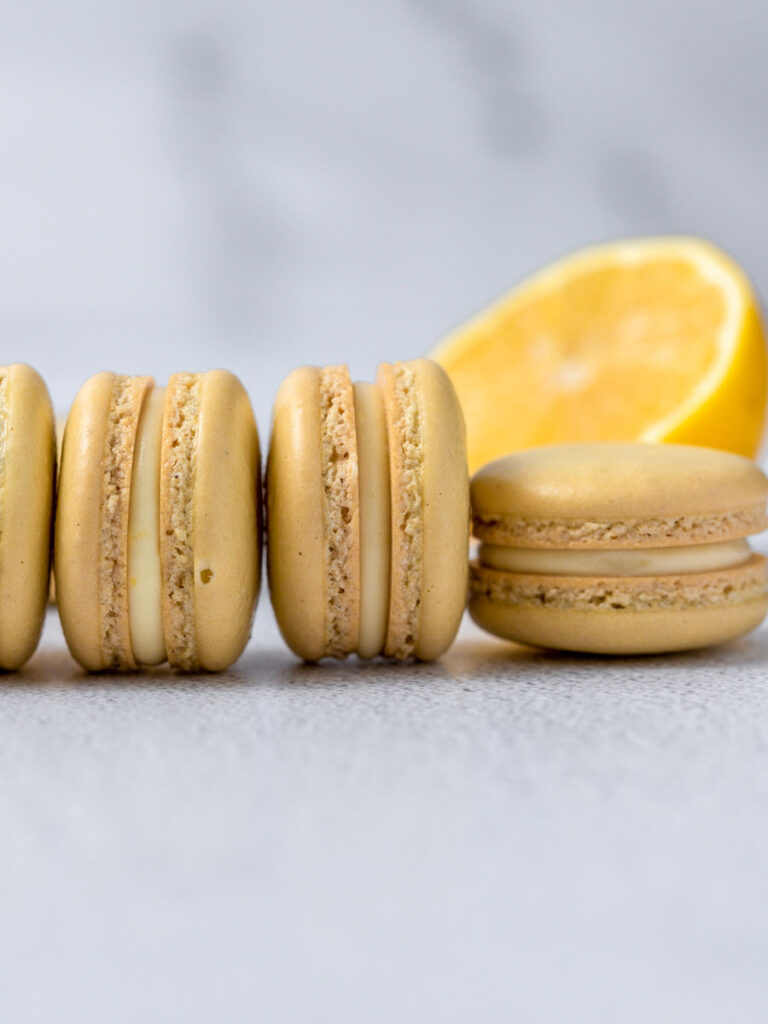 lemon macarons laid out next to each other