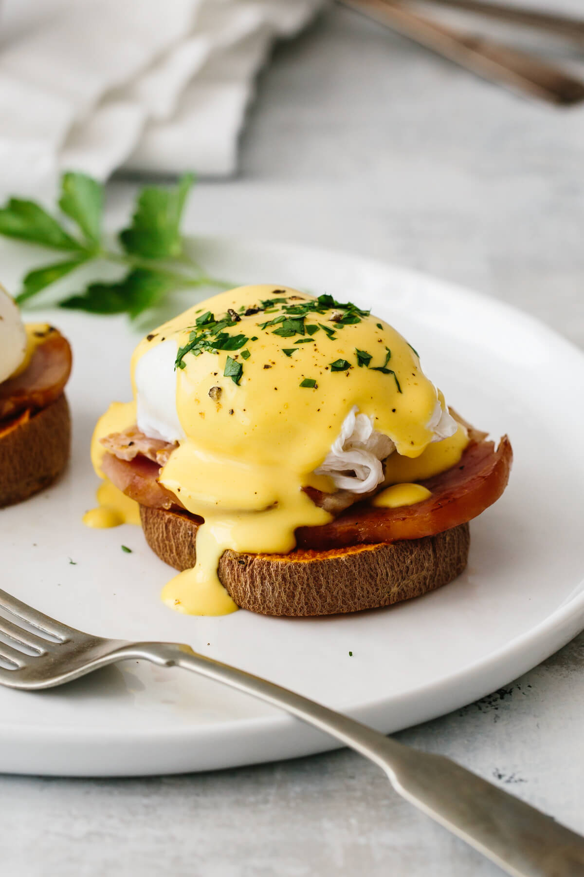 Healthy eggs benedict on a plate.