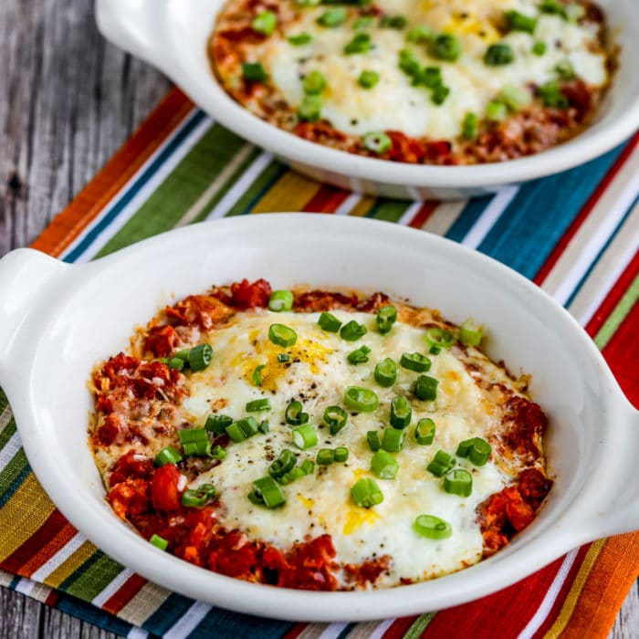 Tuscan Baked Eggs with Tomatoes thumbnail image of finished eggs in individual baking dishes