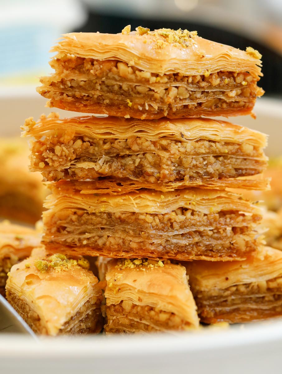 Multiple walnut baklava stacked on top of each other.