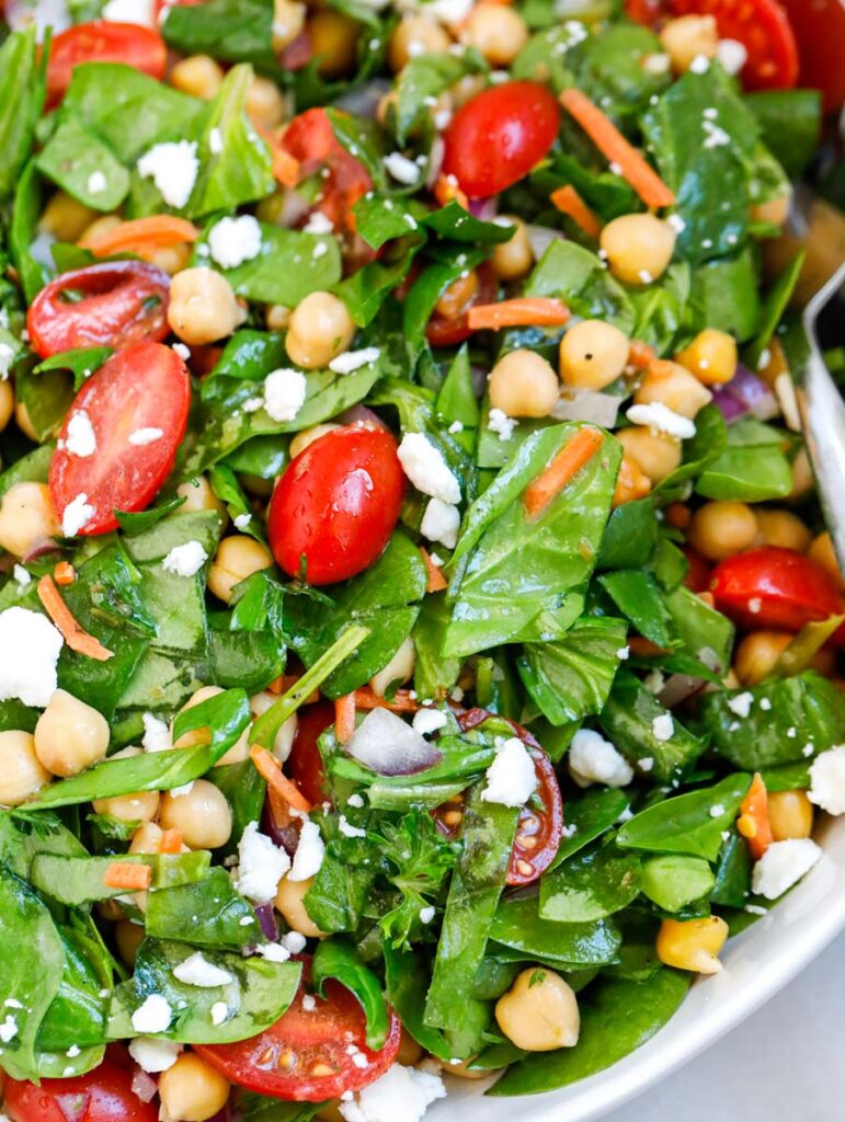 Close up of a chickpea spinach salad.