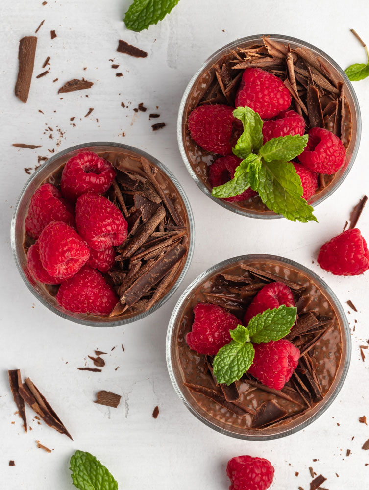 top down shot of 3 chocolate chia pudding cups