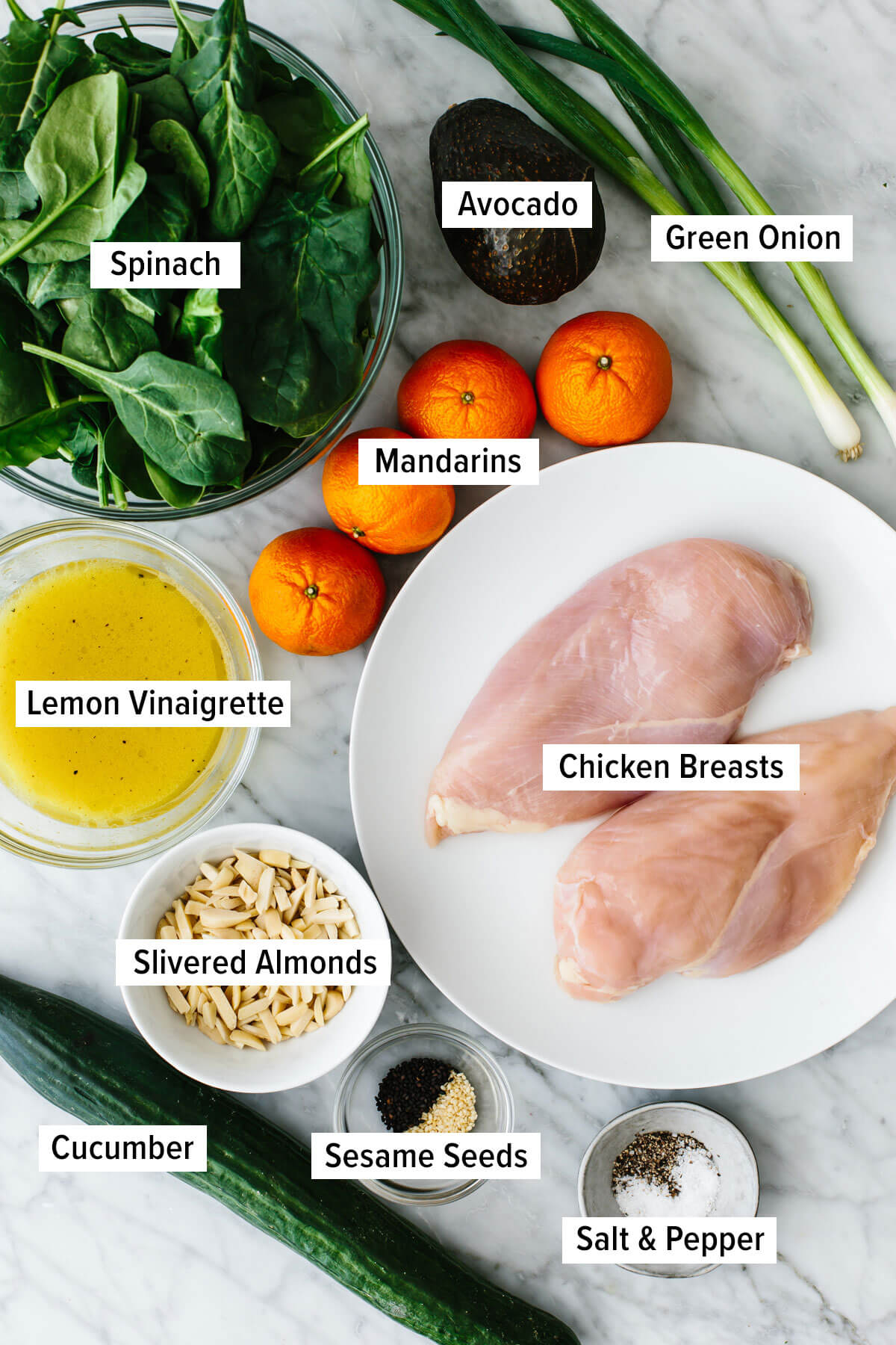 Ingredients for mandarin chicken salad on a table.