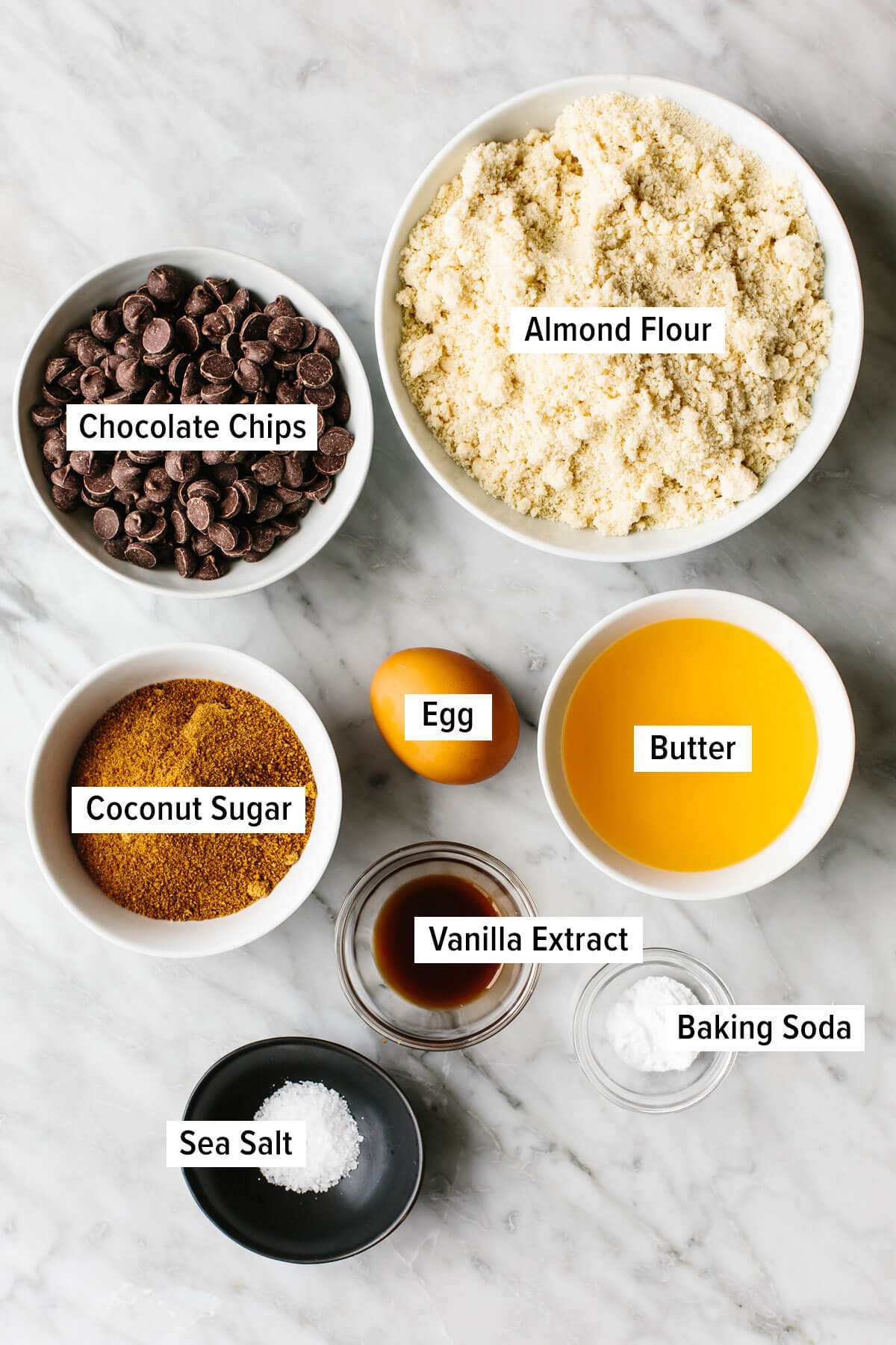 Ingredients for gluten-free chocolate chip cookies on a table.