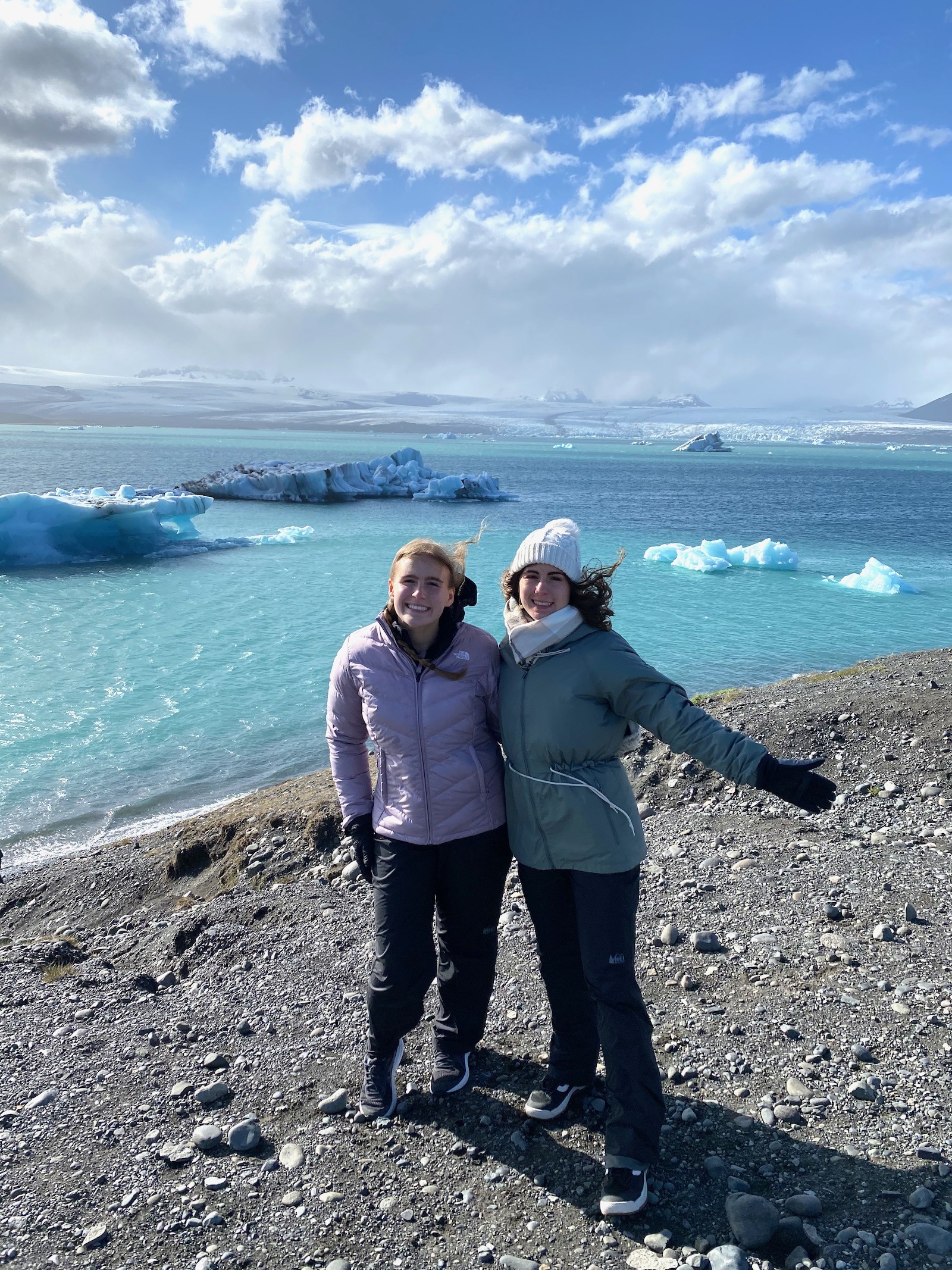Sisters posing at Glacier Lagoon in Iceland. 