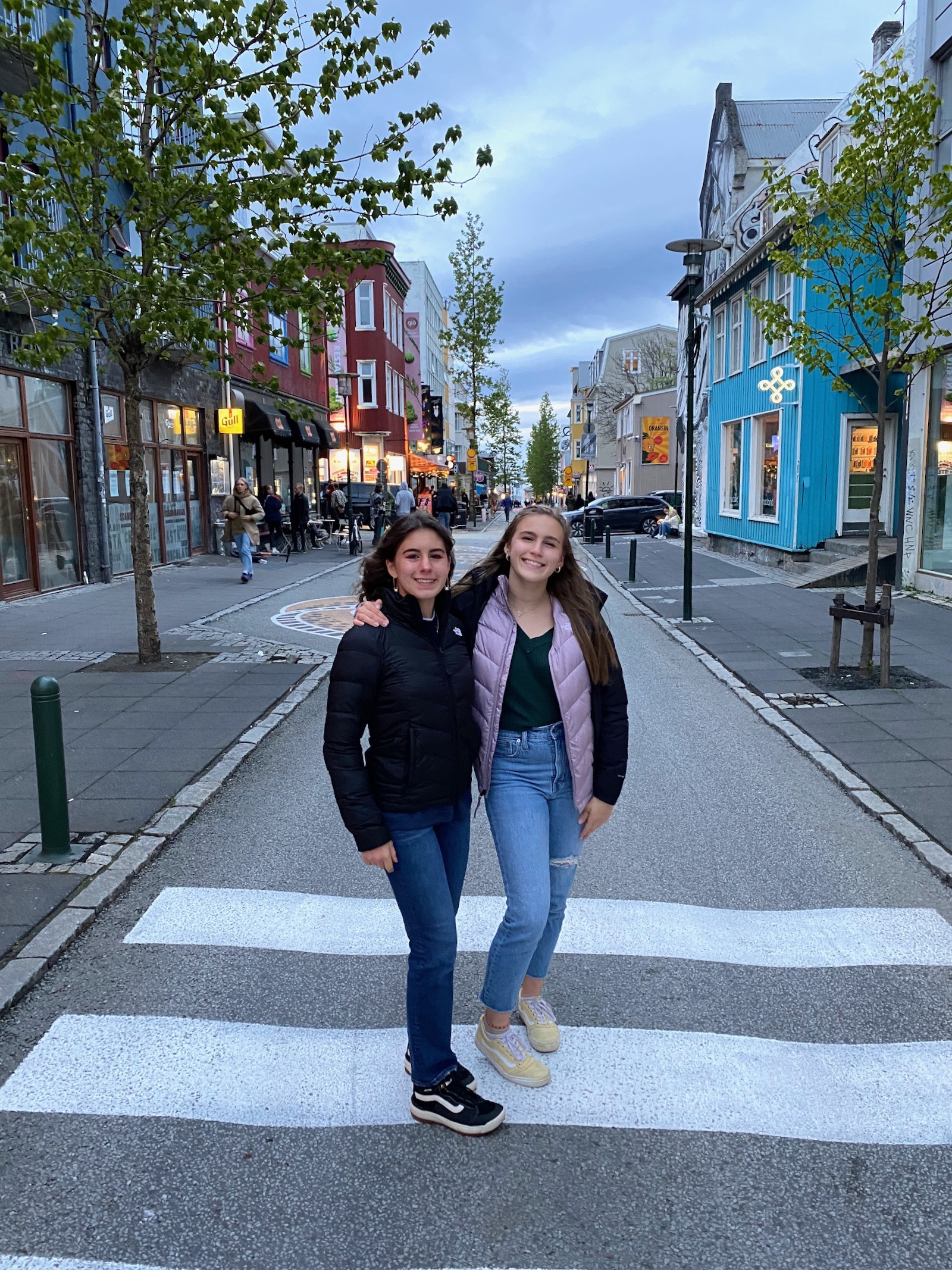 Sisters posing in the streets of Reykjavík.