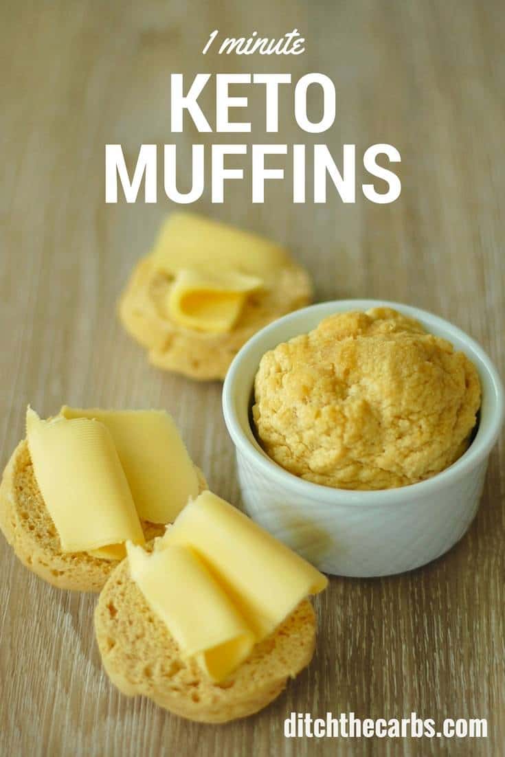 1-minute keto muffins served with butter on a wooden chopping board