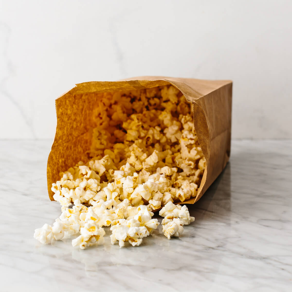 A bag with microwaved popcorn in it