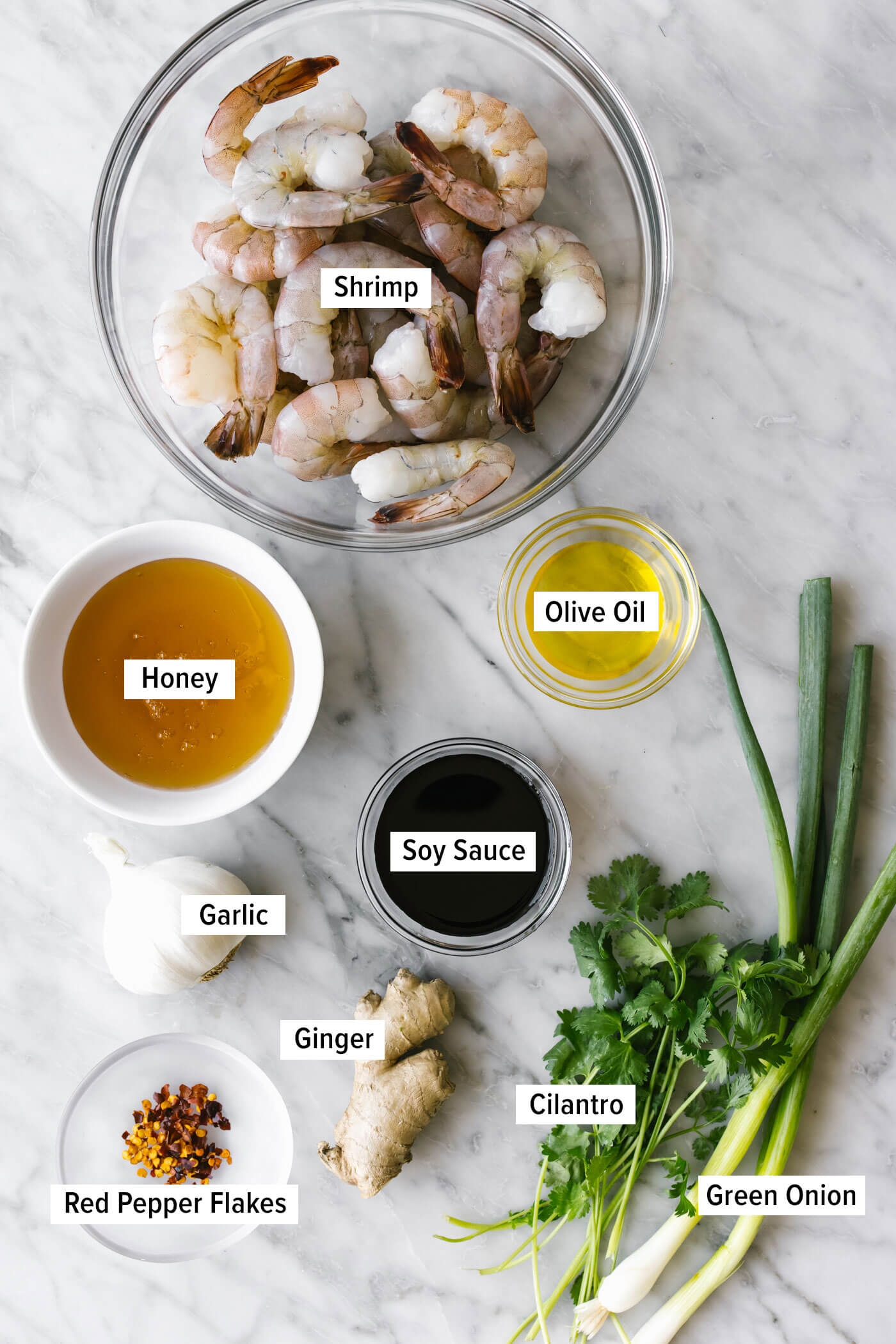 Ingredients for honey garlic shrimp on a table.