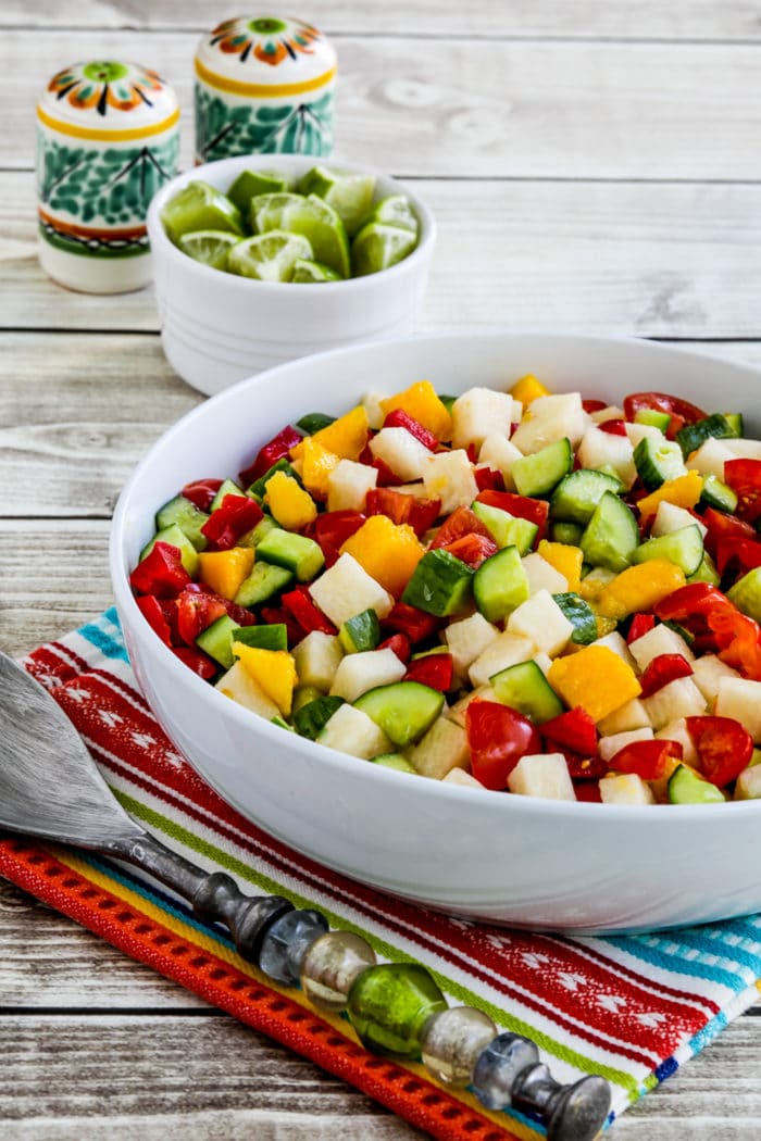 Laurel's Jicama Salad in serving bowl with limes on the side