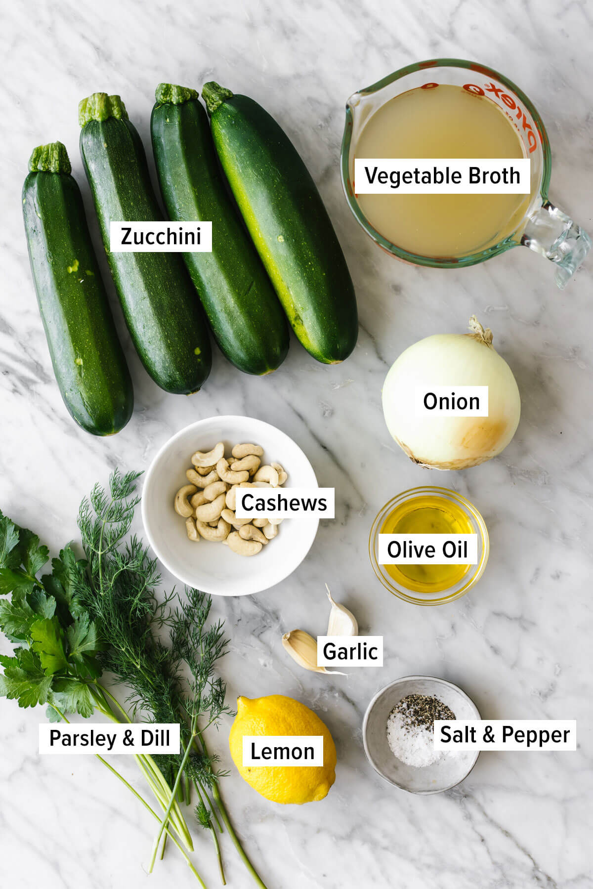 Ingredients for zucchini soup on a table