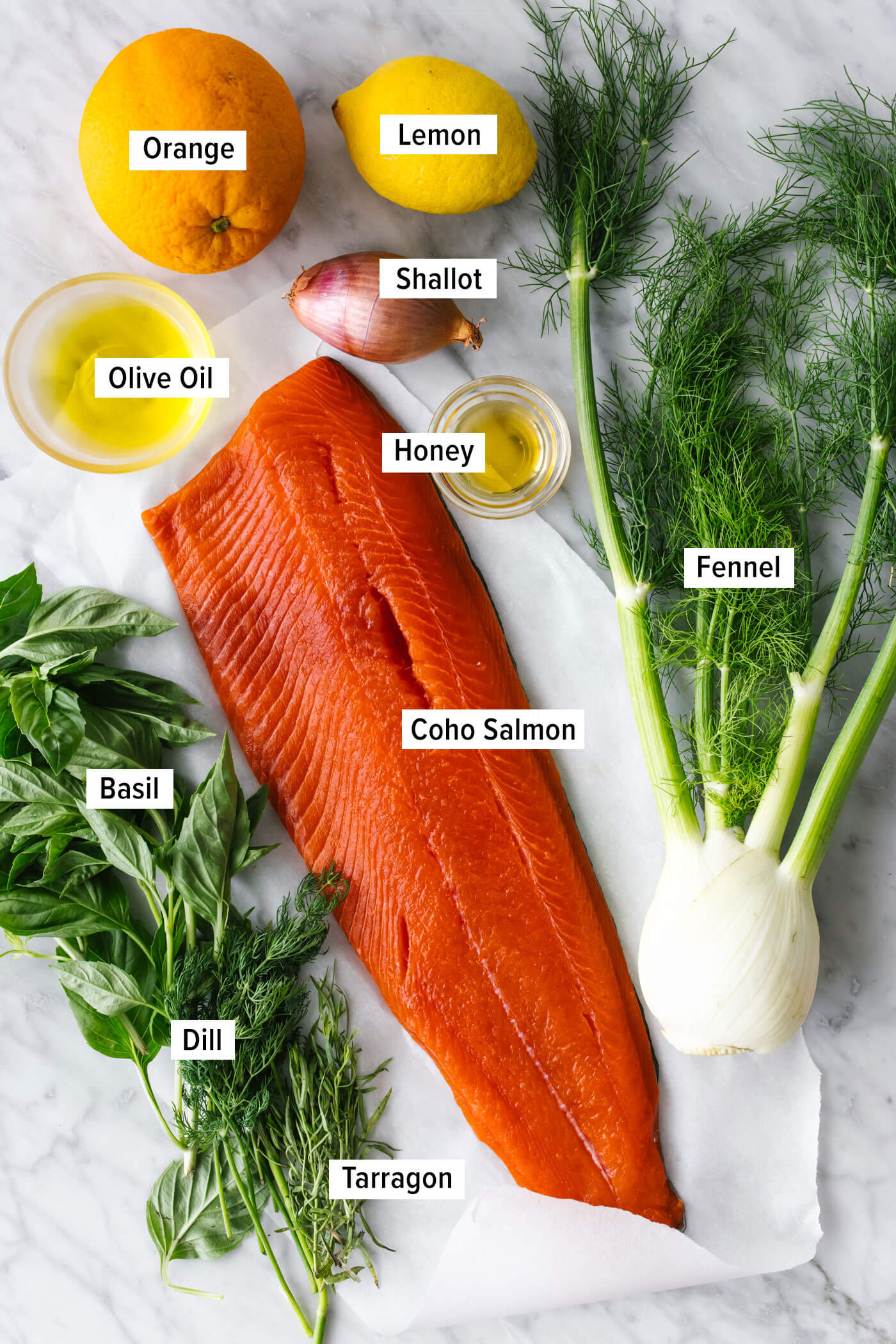 Ingredients for slow roasted salmon with fennel on a table.