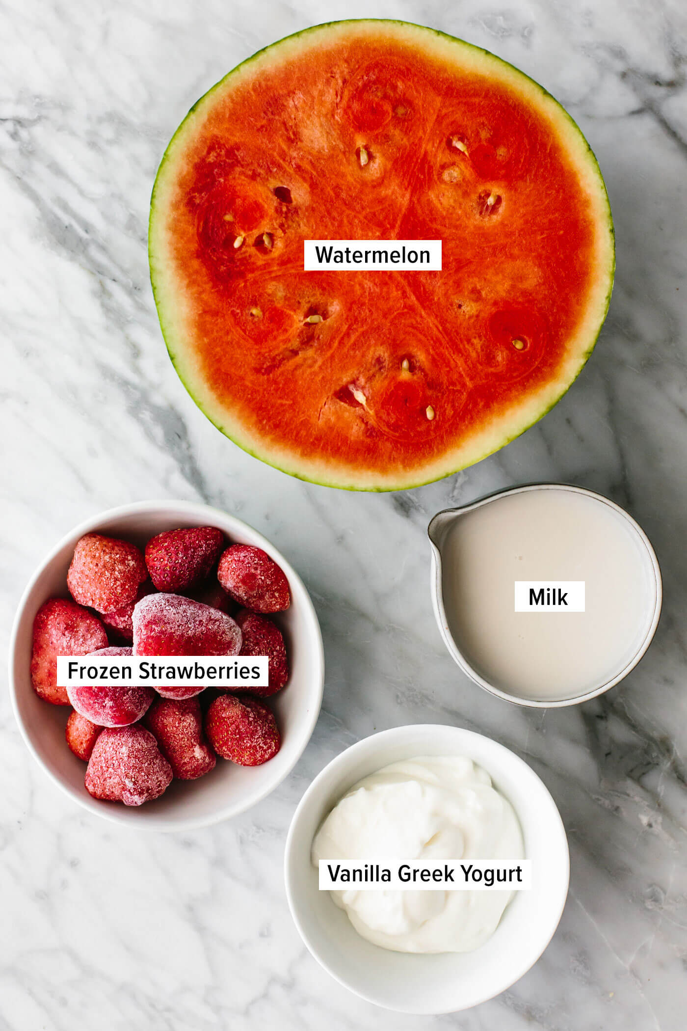 Ingredients for watermelon smoothie on a table.