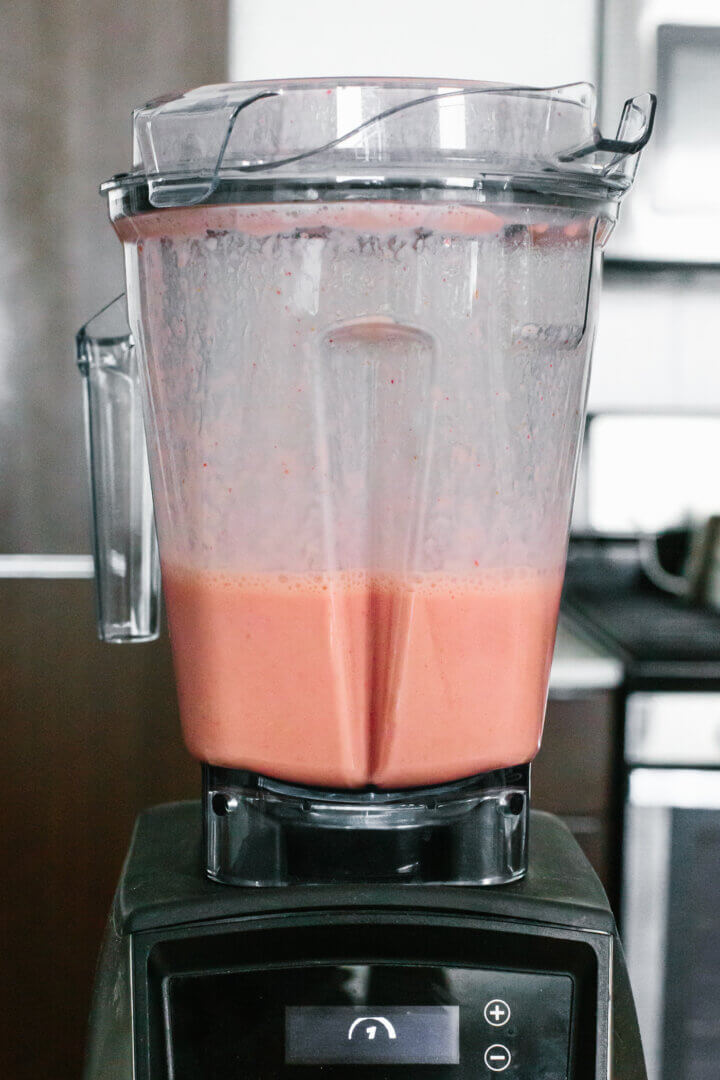 Blending a watermelon smoothie in a blender