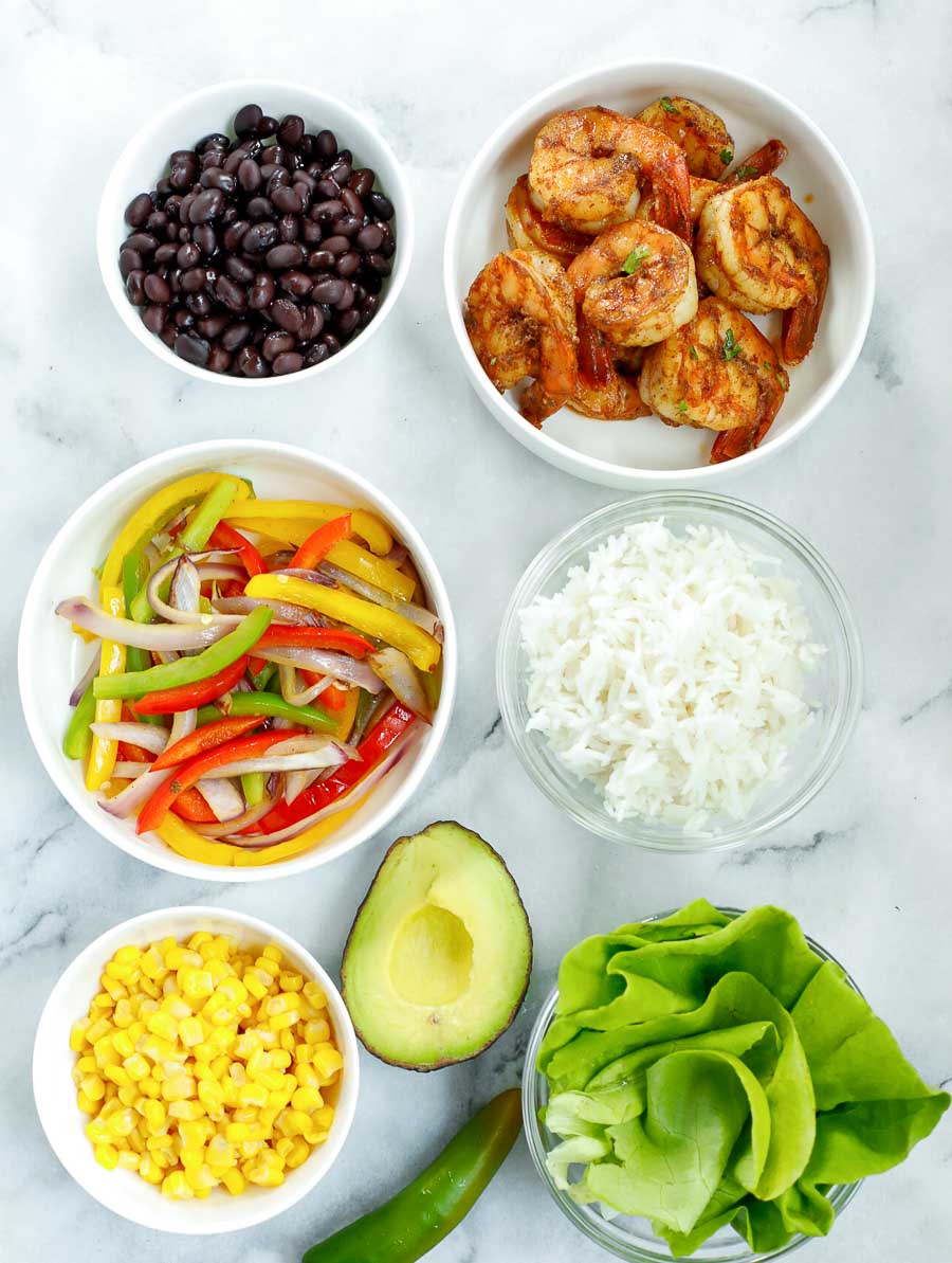 ingredients of chipotle shrimp bowl laid out