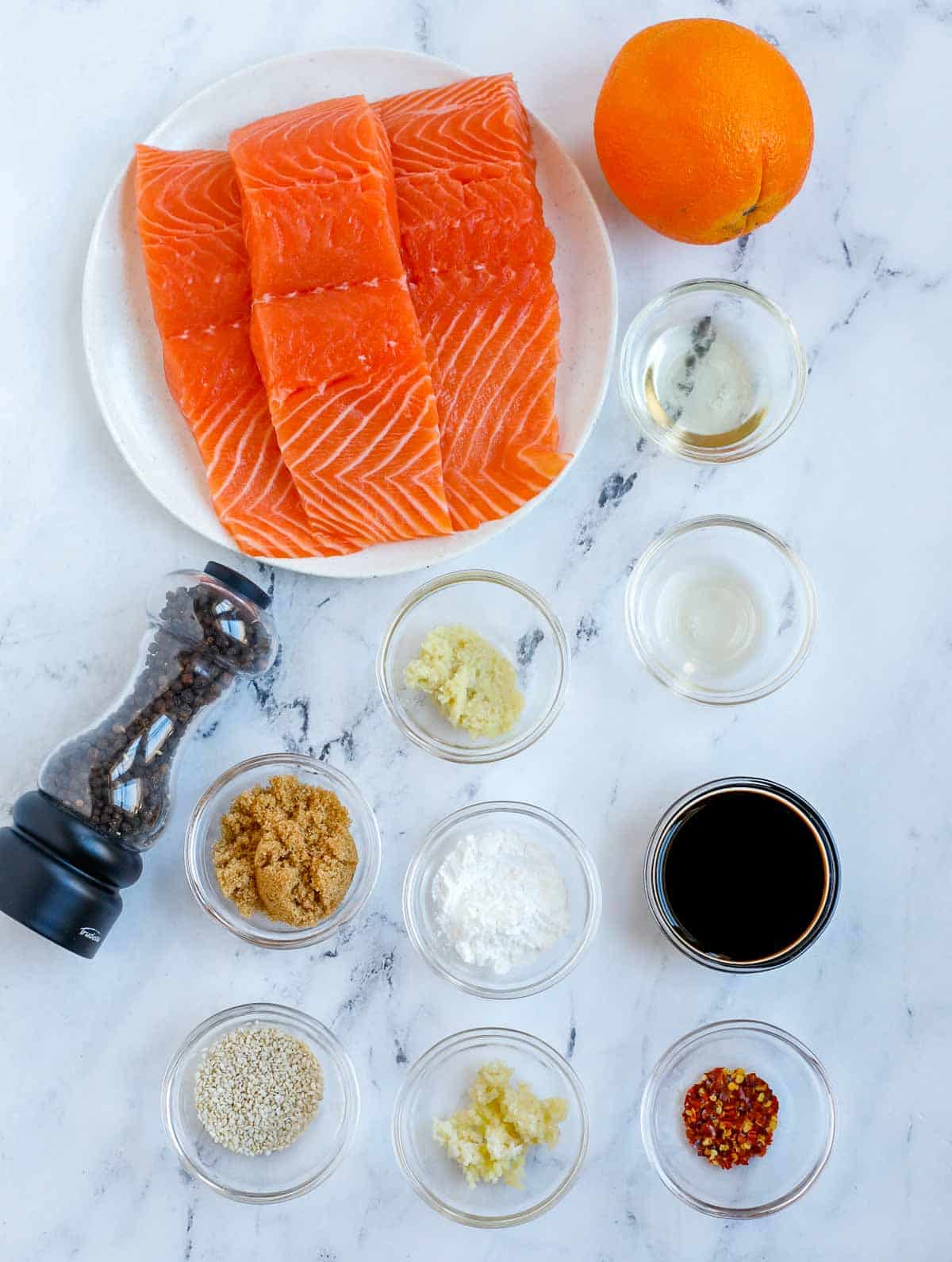 Ingredients needed to make baked teriyaki salmon.