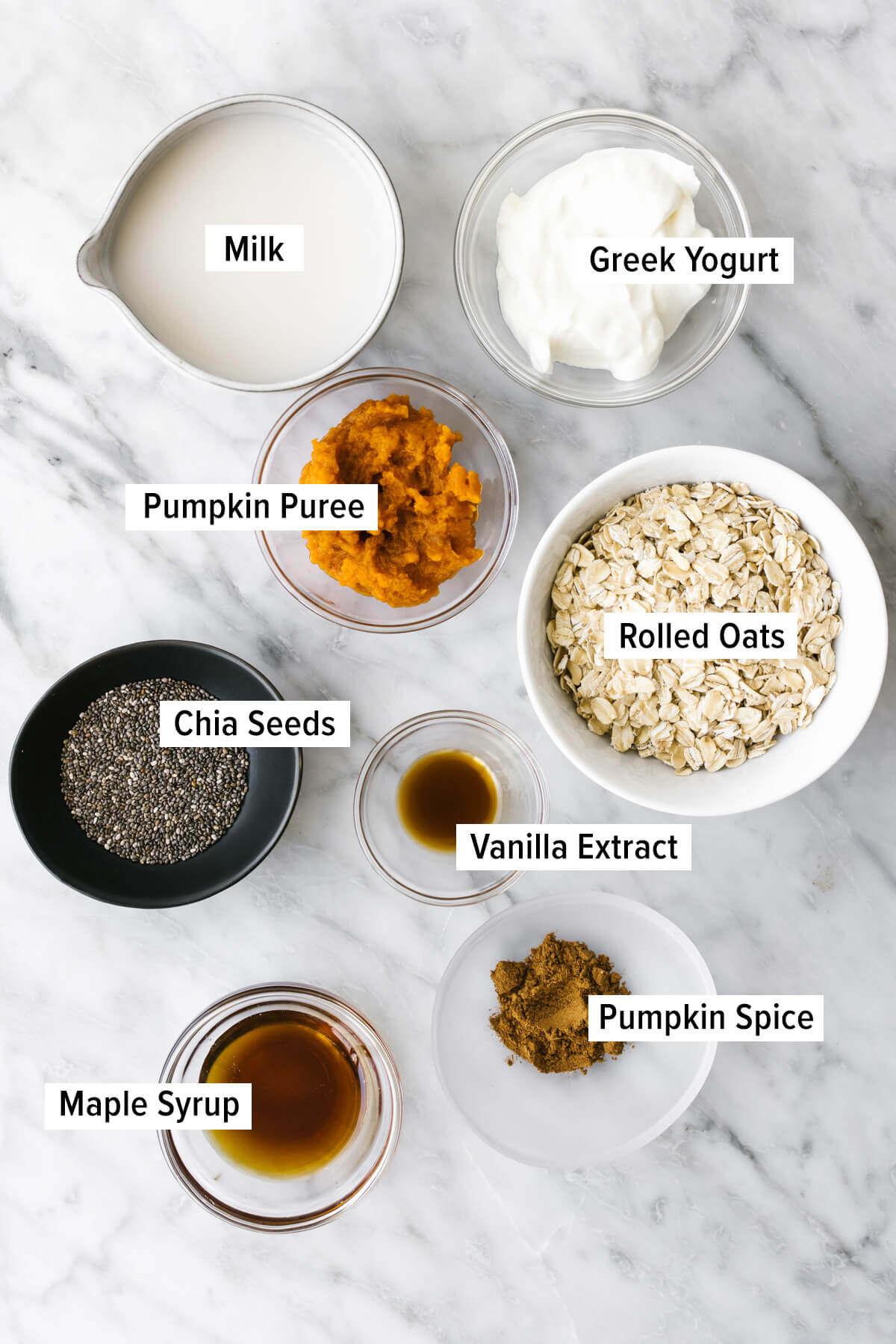 Ingredients for pumpkin pie overnight oats on a table