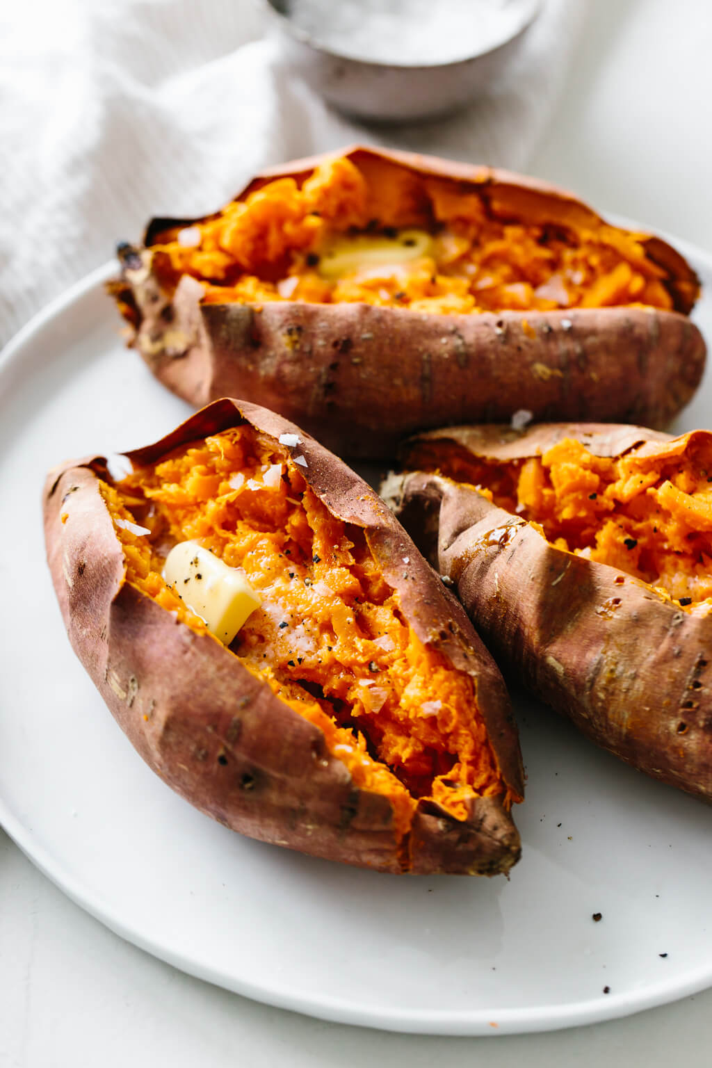 Baked sweet potato is a healthy side dish or main meal. Learn how to bake sweet potatoes in the oven perfectly. 