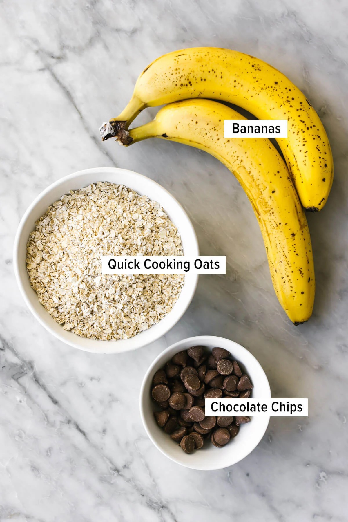 Ingredients for banana oatmeal cookies on a table.